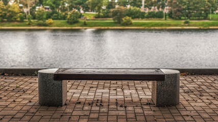 One bench on the embankment with a view of the river.