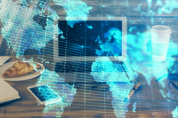 Multi exposure of business theme icons and work space with computer background. Concept of success.