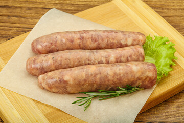Raw pork meat sausages for grill