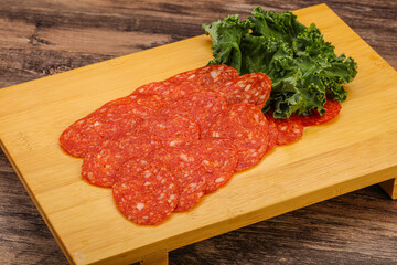 Italian spycy pepperoni sausage slices