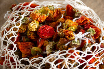 red dried bell peppers in the net bag