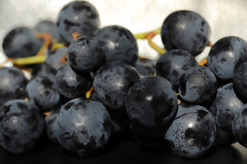 large and fresh black grapes