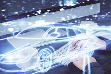 Automobile theme drawing with businessman working on computer on background. Autopilot taxi concept. Double exposure.
