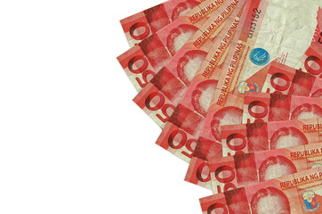 50 Philippine piso bills lies isolated on white background with copy space. Rich life conceptual...