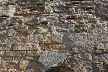 Stone wall grunge rough texture background.