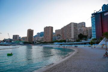 Fototapeta premium Monaco-Montecarlo, wonderful city of the cote-d‚ÄôAzur with its marine and architectures, in Larvotto beach, in a sunny day with blue sky