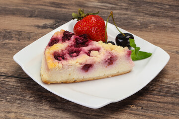 Cheesecake with cherry served strawberry