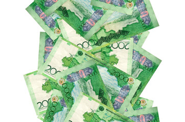 2000 Kazakhstani tenge bills flying down isolated on white. Many banknotes falling with white...