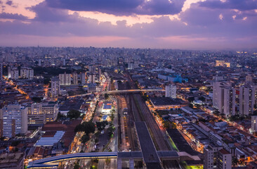 Night aerial view of Avenida Radial Leste, in the eastern region of the city of Sao Paulo, Brazil, - obrazy, fototapety, plakaty