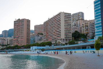 Fototapeta na wymiar Monaco-Montecarlo, wonderful city of the cote-d‚ÄôAzur with its marine and architectures, in Larvotto beach, in a sunny day with blue sky