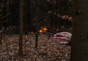 sparklers in the hands