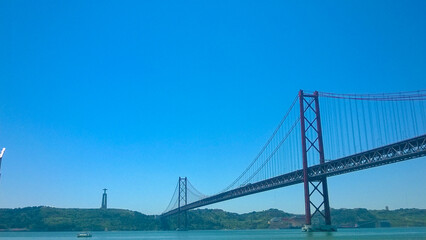 Fototapeta na wymiar 25 de Abril bridge over the river - Portugal 