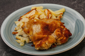 Pork schnitzel with roasted potato
