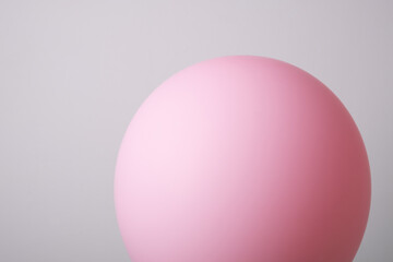 Air balloon. Pink ball on a string. Balloon for the holiday.