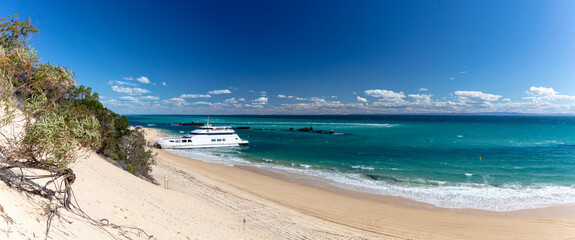 Shipwrecks and ferry on Moreton Island