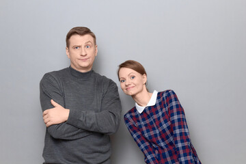 Studio portrait of couple during conversation