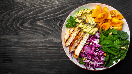 Dietary menu. Healthy salad Purple cabbage, avocado, spinach, tomatoes, fillets and nuts. Keto Paleo diet menu. banner, menu, recipe, place for text. Top view