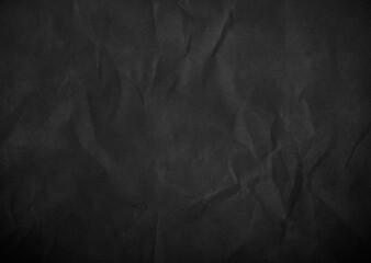   Crumpled black paper texture. Old paper background.