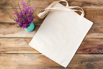 Rustic tote bag mockup with purple flowers