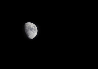 Half moon on the dark night.