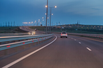 Fototapeta na wymiar Car traffic on a multi-lane highway