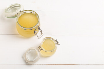 Bone broth made from chicken, beef or lamb in a glass jar