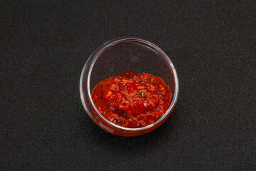 Tomato spicy sauce in the bowl