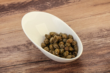 Tasty capers in the bowl