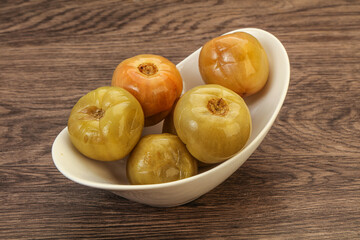 Pickled green tomato in the bowl