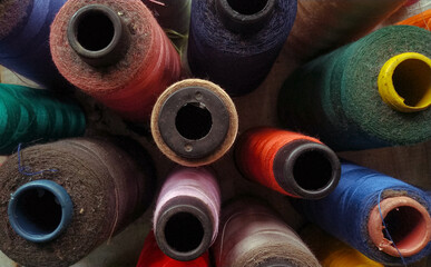 Colored thread close up, group of sewing thread, 
