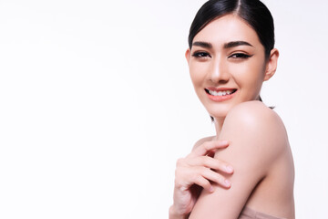 Naklejka premium Portrait of smile young woman holding hand with cosmetic cream or treatment moisturize in her body for skin care on isolated on white background. Healthy skin and cosmetics concept.