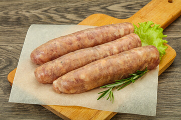 Raw pork meat sausages for grill