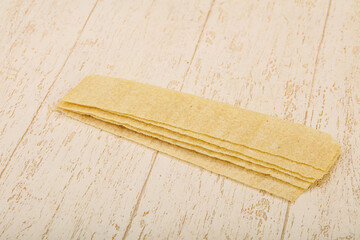 Natural salted potato chips heap