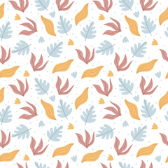 Obraz na płótnie Canvas Autumn pattern. Colored leaves flowers on a white background.Autumn or winter composition.Perfect for wallpaper, gift paper, pattern fills, web page background, autumn greeting cards.