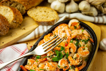 Shrimp on fork, garlic butter shrimp