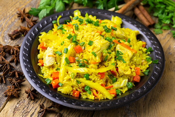 Fried rice and chicken and vegetables
