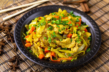 Soya noodles with chicken and vegetables, oriental food