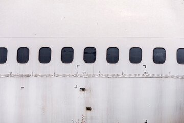 Window detail of a deteriorated airplane, Old airplane, Airplane wreck.