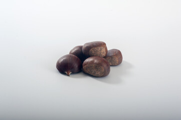 Chesnuts on white background