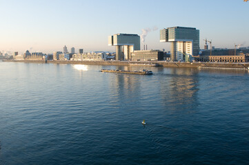 The skyline of the modern part of Cologne with its Kranh&auml;user in winter.