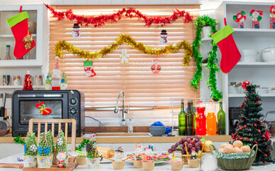 copy space decorated kitchen prepared for Christmas and tableware.