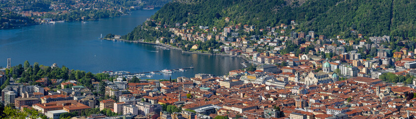 Fototapeta na wymiar Como - The city among the mountains and lake Como.
