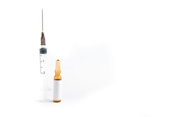 Coronavirus 2019-nCoV outbreak. Capsule and syringe on a white isolated background. Pills and drug, care during illness.