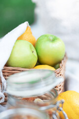 two green apples in a basket