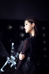 Fototapeta na wymiar halloween style girl in long black dress