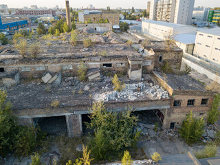 Obraz premium Aerial drone view. The destroyed workshop of the plant.