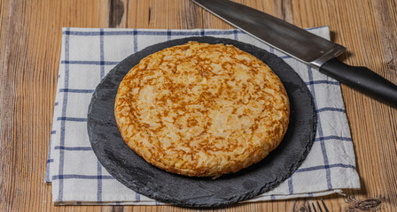 Spanish omelet with potatoes and onion, typical Spanish cuisine