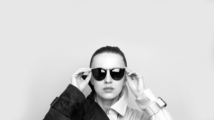 Young elegant woman in trendy coat