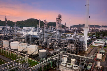 Aerial view of dusk sky scene with  Industrial view at oil refinery plant form industry zone ,which...