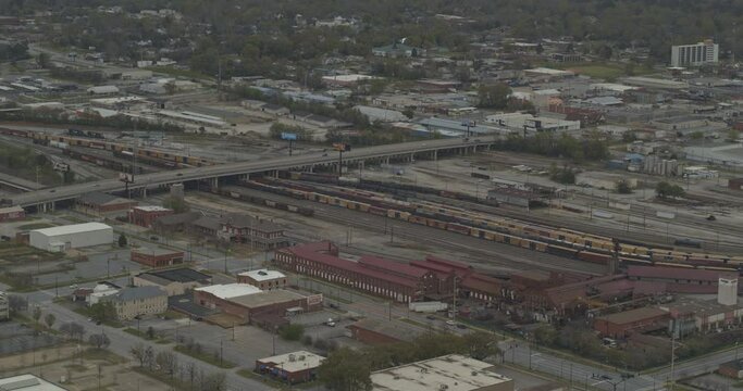 Columbus Georgia Aerial v7 pan left shot of railroad and warehouses in Phenix City - DJI Inspire 2, X7, 6k - March 2020